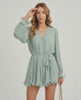 Aurelia Mini Dress by Lauven in soft sage green chiffon with pleated texture and V-neck design.