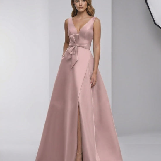 Roselle Maxi Dress in pink satin with A-line silhouette, V-neck, and elegant bow detail by Lauven.
