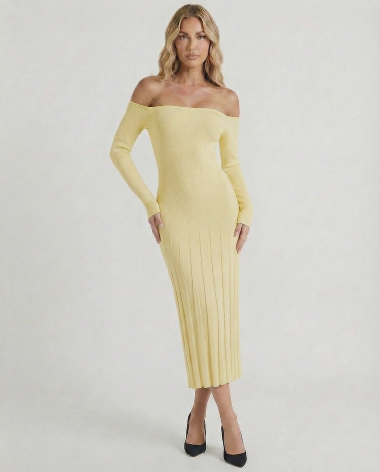 Solara Midi Dress by Lauven in soft yellow, featuring an elegant off-shoulder style and ribbed knit fabric.
