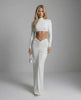 Celeste Maxi Dress by Lauven – Sleek white ankle-length dress with long sleeves and ruching detail.