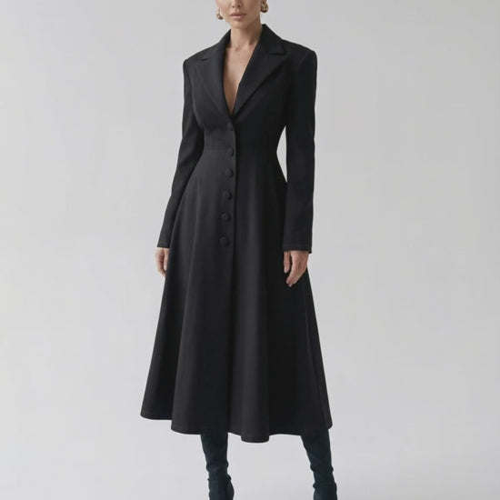 Valen Midi Dress: Elegant black A-line blazer dress with long sleeves by Lauven, enhancing feminine sophistication.