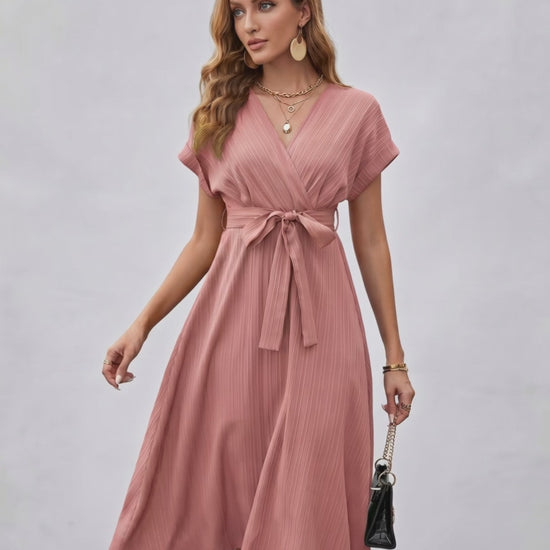 Serene Midi Dress by Lauven, pleated fabric, V-neck, A-line silhouette, self-tie belt for adjustable shaping.