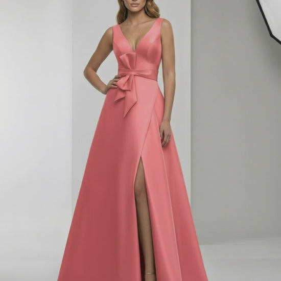 Valencia Maxi Dress featuring a coral satin finish, A-line silhouette, deep V-neck, and elegant floor-length design by Lauven.