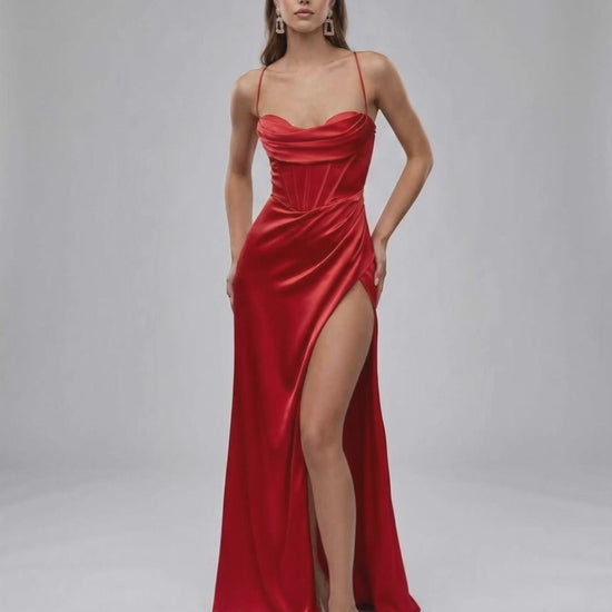 Liora Maxi Dress in luxury red satin features strapless design and thigh-high slit, embodying modern glamour by Lauven.