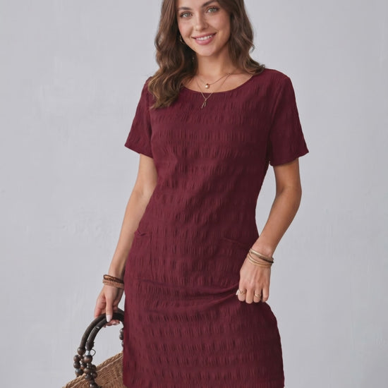 Avelin Mini Dress by Lauven, features textured fabric and round neckline for a modern, stylish look.