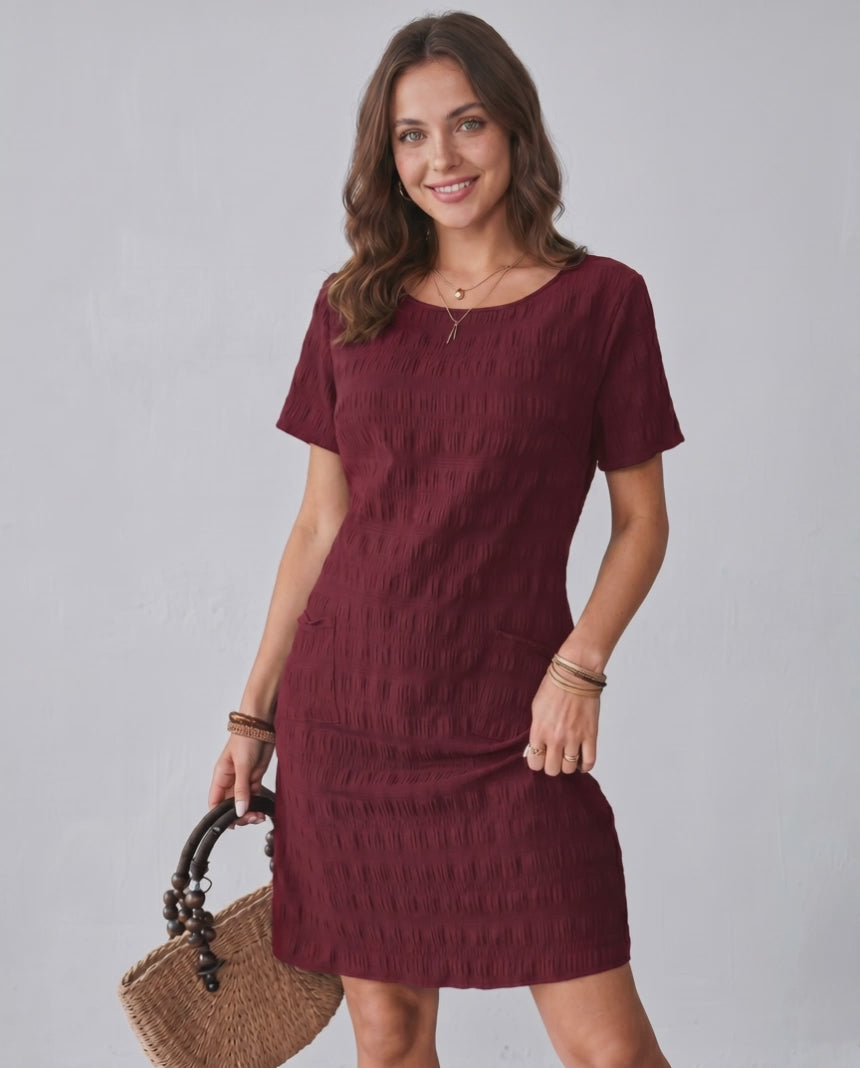 Avelin Mini Dress by Lauven, features textured fabric and round neckline for a modern, stylish look.