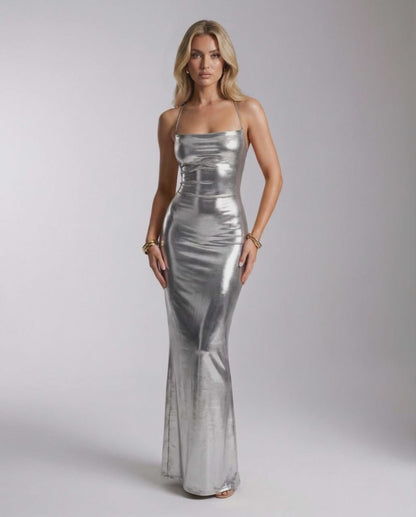 Celestia Maxi Dress in silver metallic, features a sleek fit and open back, by Lauven, perfect for a glamorous evening.