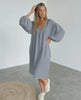 Orion Midi Dress in gray cotton, featuring puff sleeves and a v-neck design for a modern, minimalist look by Lauven.