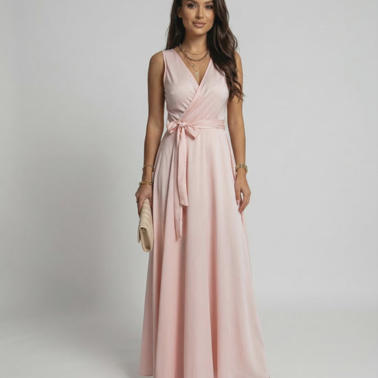 Celeste Maxi Dress by Lauven, featuring a soft blush pink color and elegant V-neck design.