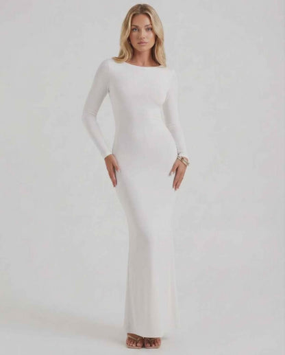Lauven Celeste Maxi Dress in elegant white with long sleeves and open back, perfect for formal occasions.