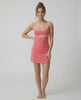 Luna Mini Dress by Lauven featuring patchwork design, cut-out detail, and a vibrant pink color.