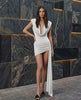 Sienna Mini Dress - draped backless bodycon elegance in white, featuring pleating and a sculpted silhouette by Lauven.