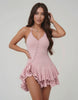 Elara Mini Dress by Lauven, pink bodycon dress featuring ruffle hem and halter neck silhouette.