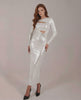 Lumiera Maxi Dress featuring long sleeves, cut-out detail, metallic accents, and a sleek fit by Lauven.