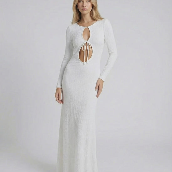Serene Maxi Dress by Lauven in textured white cotton-polyester blend with elegant hollow-out details.