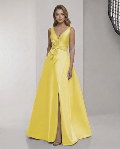 Solenne Maxi Dress – Yellow satin A-line with V-neck, bow detail; elegant and radiant from Lauven.