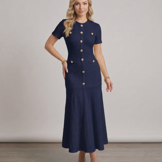 Aureline Maxi Dress featuring textured knit, round neck, and flared hem by Lauven, exuding elegance and fluidity.