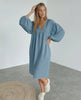 Aurelia Midi Dress in blue cotton, featuring puff sleeves and a flattering v neck, offering comfort and elegance by Lauven.