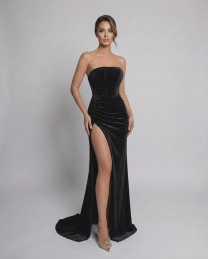 Noir Maxi Dress by Lauven, a stunning strapless velvet evening gown with a high slit and sleek sheath silhouette.