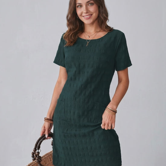 Avelin Mini Dress in textured fabric, round neckline, short sleeves, ideal for warm weather by Lauven.