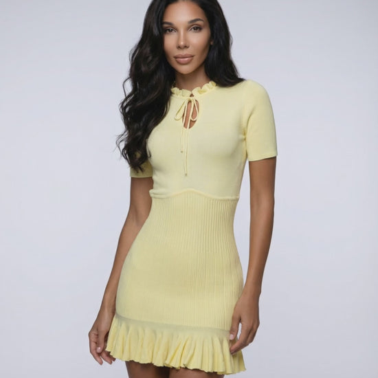 Elara Mini Dress - light yellow ribbed knit A-line with ruffle hem, modern femininity by Lauven.