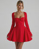 Scarlet Mini Dress featuring a vibrant red hue, square neckline, ruched bow detail, and long sleeves. Lauven brand.