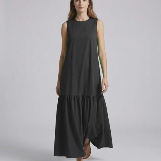 Nocta Midi Dress - Black sleeveless dress with relaxed silhouette for effortless summer style by Lauven.