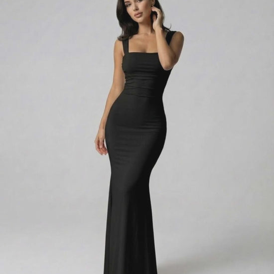 Onyx Maxi Dress by Lauven, elegant strappy back silhouette in classic black, fitted for a flattering look.