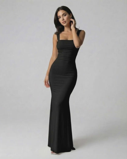 Onyx Maxi Dress by Lauven, elegant strappy back silhouette in classic black, fitted for a flattering look.