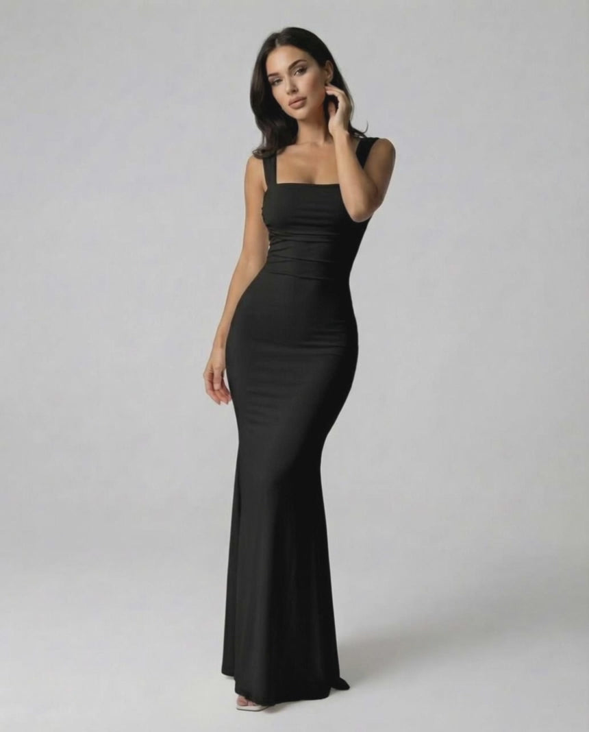 Onyx Maxi Dress by Lauven, elegant strappy back silhouette in classic black, fitted for a flattering look.