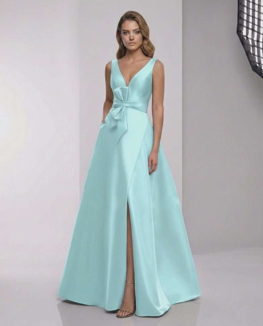 Avelisse Maxi Dress featuring mint satin A-line design, V-neck and elegant bow detail from Lauven.
