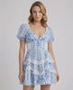 Azure Mini Dress by Lauven, features blue floral print, tiered ruffles, and flattering A-line silhouette.