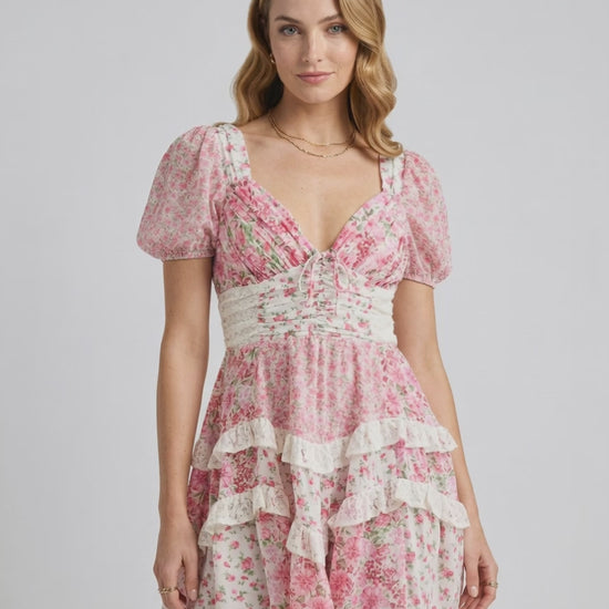Ivy Mini Dress by Lauven featuring a floral print, puff sleeves, A-line silhouette, and deep V-neckline.