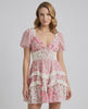Ivy Mini Dress by Lauven featuring a floral print, puff sleeves, A-line silhouette, and deep V-neckline.