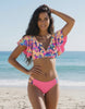 Lauven Serena Two-Piece Swimsuit featuring vibrant floral print and pink hues, perfect for beach outings.