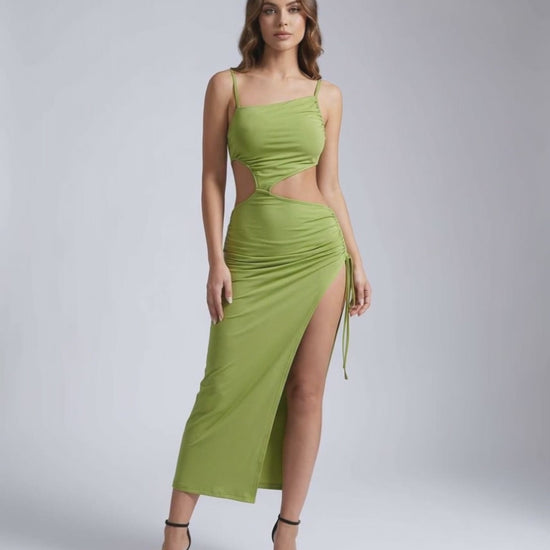 Vega Midi Dress in green with hollow out accents and ruching for a stunning evening look by Lauven.
