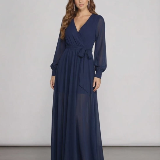 Noctra Maxi Dress in navy chiffon, featuring long sleeves and a wrap front V-neckline, elegant eveningwear by Lauven.