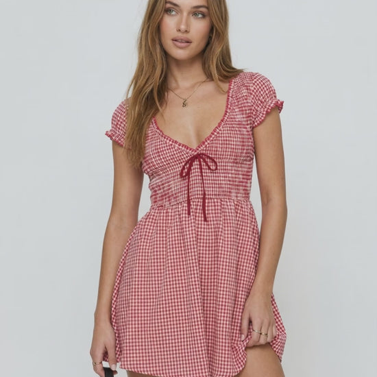 Azura Mini Dress by Lauven, red checkered sleeveless dress with empire waist and O-neck design.