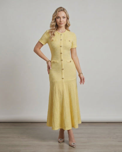 Aureline Maxi Dress by Lauven in textured knit, yellow with round neck, featuring a flared hem for fluid movement.