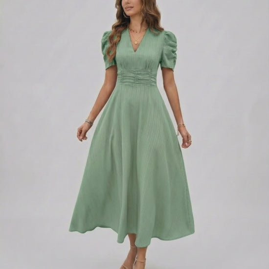 Verdant Midi Dress in sage green, featuring a V-neckline, puff sleeves, and ruched waist by Lauven for elegant occasions.