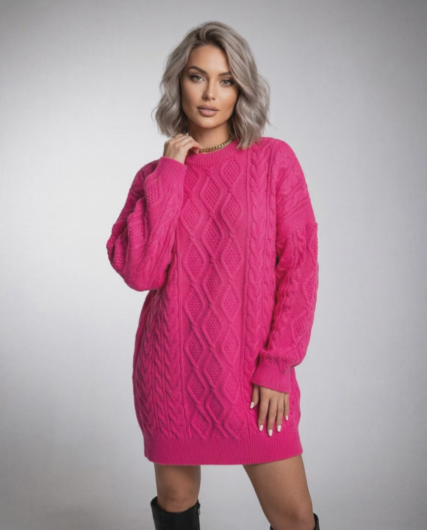 Luna Mini Dress by Lauven in vibrant pink cable knit with relaxed silhouette and long sleeves.