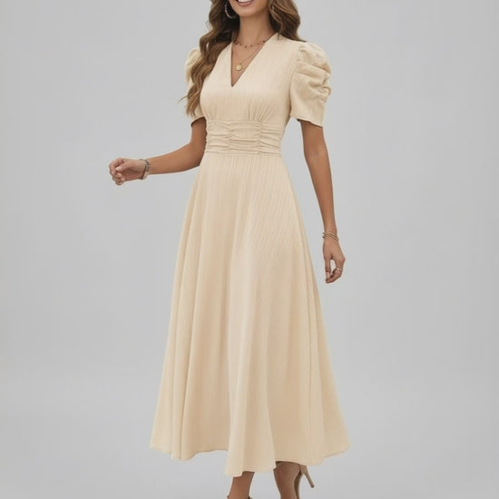 Aurelia Midi Dress cream dress with sleeves for elegant occasions, featuring a flattering V-neckline and ruched waist.