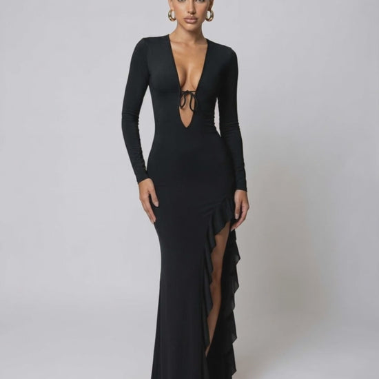 Monaco Maxi Dress featuring deep V-neck, ruffle high slit, and long sleeves by Lauven for a sleek, elegant look.