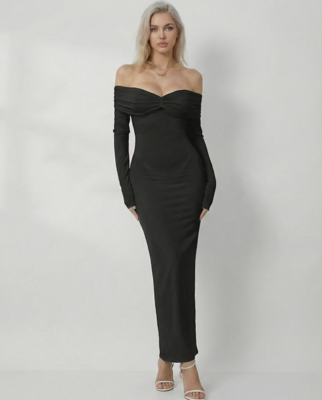 Noir Maxi Dress by Lauven, showcasing a sleek off-shoulder design with a slim fit and elegant black fabric.