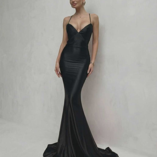 Monaco Maxi Dress featuring sleek black satin, lace-up back, V-neck silhouette, and crafted by Lauven for a stunning look.