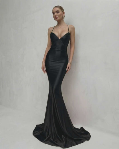 Monaco Maxi Dress featuring sleek black satin, lace-up back, V-neck silhouette, and crafted by Lauven for a stunning look.