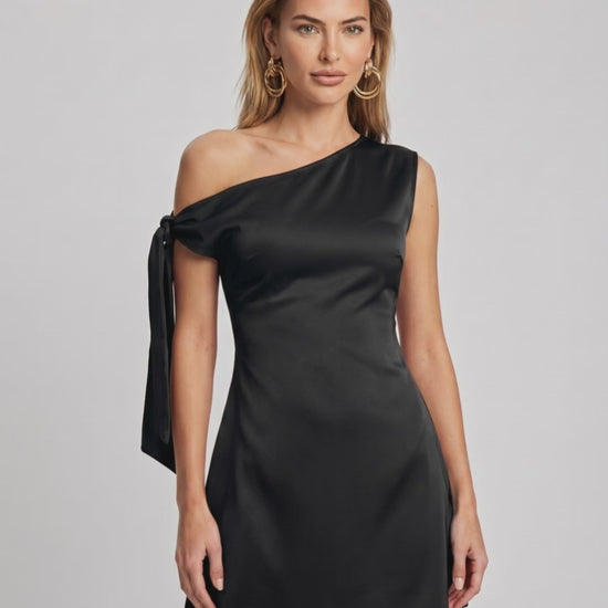 Veloura Mini Dress: Satin finish, asymmetric neckline, A-line silhouette by Lauven for a modern, chic look.