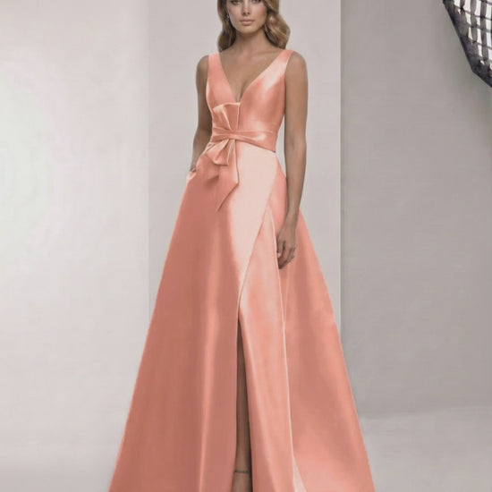 Elegant Solara Maxi Dress by Lauven, satin A-line peach dress with V-neck and bow detail, perfect for formal occasions.