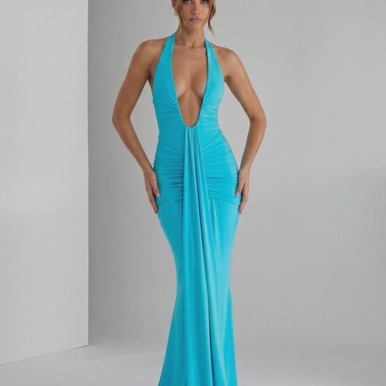 Aurelia Maxi Dress in turquoise, featuring a halter neck and stylish ruching for a sleek, modern look by Lauven.
