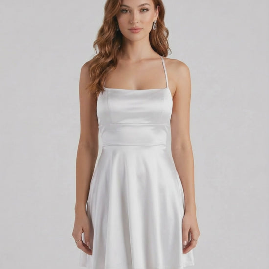 Silver Satin Mini dress by Lauven featuring a smooth satin finish and flattering A-line silhouette.